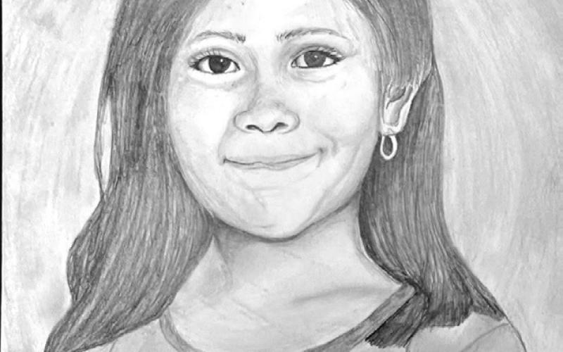 Self-portrait drawing by Ariana Mora Romo, an eighth-grader in Art II at Rockdale Junior High School.