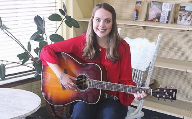Rockdale High grad writes, sings way to win