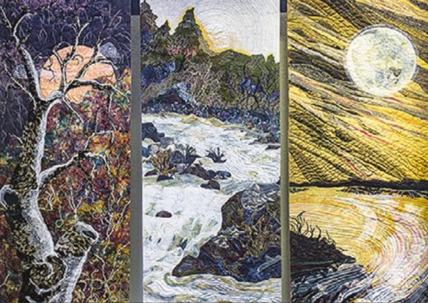 Quilt museum exhibit bathed in seasonal colors