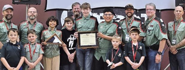 PRESENTATION—Texas House Rep. Stan Gerdes gave Trail Life Troop TX-1516 a Texas flag that was flown over the Texas Capital in honor of the troop. Included was a certificate that read in part, this flag “was flown at the Capital of the Sovereign State of Texas in recognition of your organization providing youth mentorship and character development.” Our local Rockdale Trail Life Troop is proud to have received this flag. We are very thankful to Rep. Gerdes for honoring us in this way,” said Pastor Steve Ammo