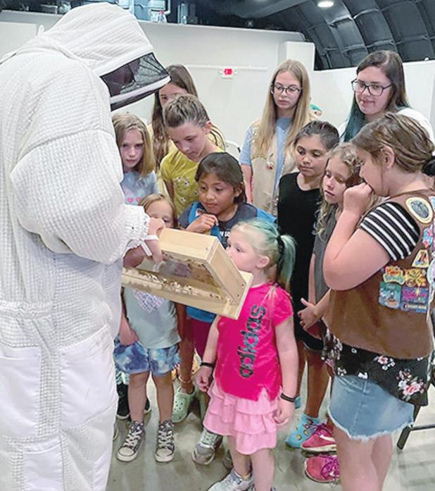 Girl Scouts learning, helping others