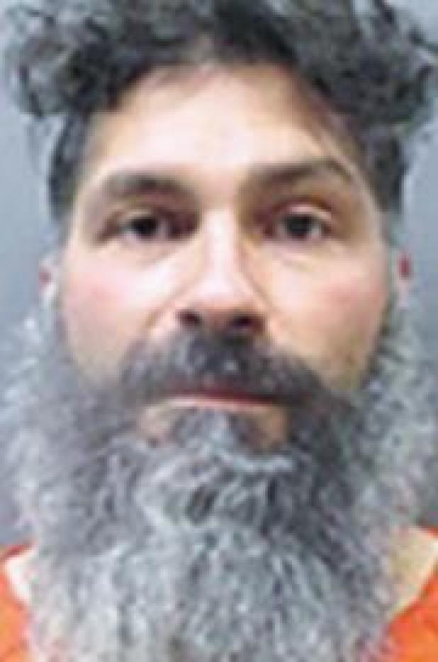 Man charged in shooting death south of town