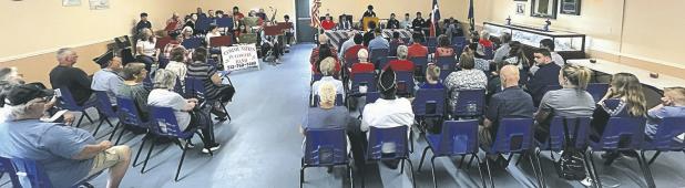 MEMORIAL DAY OBSERVANCE— American Legion Carlyle Post 358 held a Memorial Day program on Monday celebrating service members from Milam County who lost their lives in WWI to present day. RHS students involved in FFA and NHS, Luke Olivares, Aiden Svrcek, Sebastian Lepe, James Cox and Cohen Razo, read the names of each hero as the audience responded “here” to each one. The Communities in Concert Band provided lively patriotic music to a packed house. Refreshments and visiting followed the program.