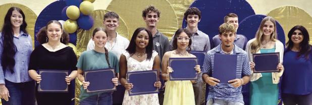 Rotary Scholarship winners (not in order) Brody Willard $2,000, Destinee Bluford $2,000, Blake Vance $1,000, Chase Nadeau $1,000, Alex Cooper $1,000, Emily Zientek $1,000, Jayden Davenport $1,000, Grace Patton $1,000, Aaliyah Aspilaire $1,000, Zarriah Arvizu $1,000 and Mason Lillard $1,000 with Macy Wages and Melissa Barchuch.