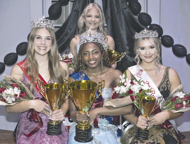 FAIR ROYALTY— Aaliyah Aspilaire (seated center) was crowed the 2025 Miss Rockdale Fair Queen at the annual pageant held Saturday night at the RHS auditorium. First runner-up (L) is Grace Patton and second runner-up (R) is Kenley Harris. Standing is Miss Congeniality Hadley Brooks. Fourteen contestants competed for the title. Emcee was Miss Texas America Sadie Schiermeyer.