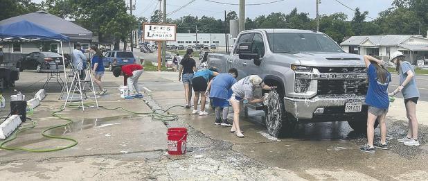 WORKING AT THE CAR WASH