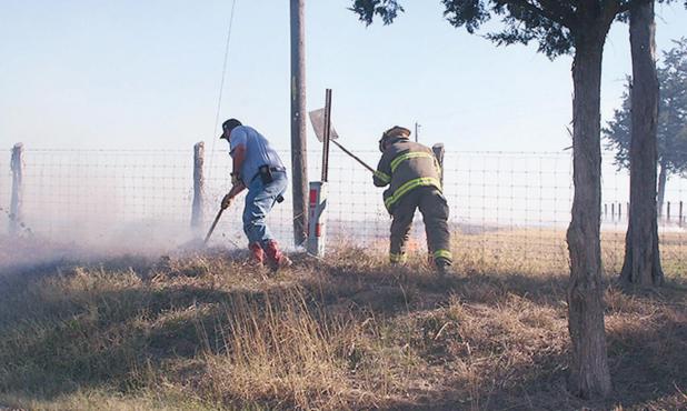 	Rockdale, others battle grass fire 