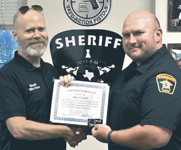 PROMOTION— Milam County Sheriff Mike Clore presents newly minted Lieutenant Jake Schneebeli with his promotion certificate. “Lt. Schneebeli started with the sheriff’s office in 2022 and has proven to be a good leader and hard worker,” Clore said. “Schneebeli graduated from the Police Academy this past December and now he’s earned this deserved promotion.