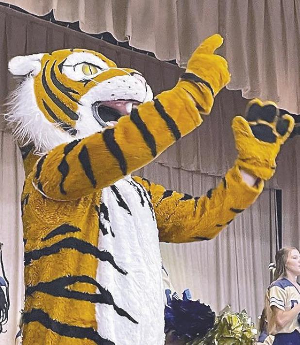 ROCKY DIRECTS FIRST PEP RALLY