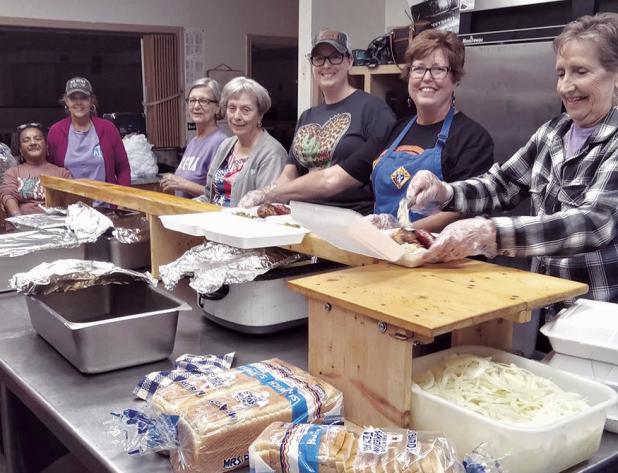 FUNDRAIS-ER— The Knights of Columbus held a barbecue chicken fundraiser on Sunday and the busy workers sold over 300 plates which included a barbecue half chicken, sausage, German potatoes, green beans and dessert. Shown are (L-R) Martha Jeffcoat, Kelly David, Vicky Svetlik, Barbara Walko, Amy Caffey, Genella Korenek and Pat Barcak.