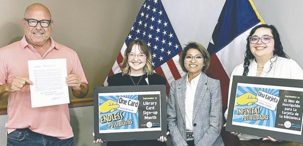 Mayor Ward Roddam proclaimed September as Library Card Sign-up Month at Monday’s council meeting. Shown here (L-R) are Roddam, Olicia Schuch, Library Director Lisa Riggs and Eliabeth Kelley.