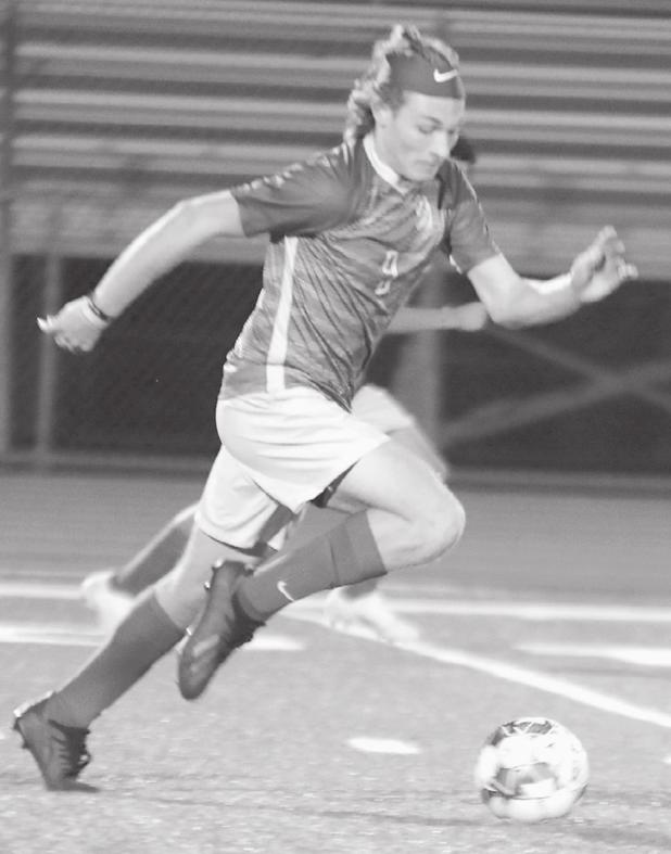 Players, exes have fun night at first alumni soccer match