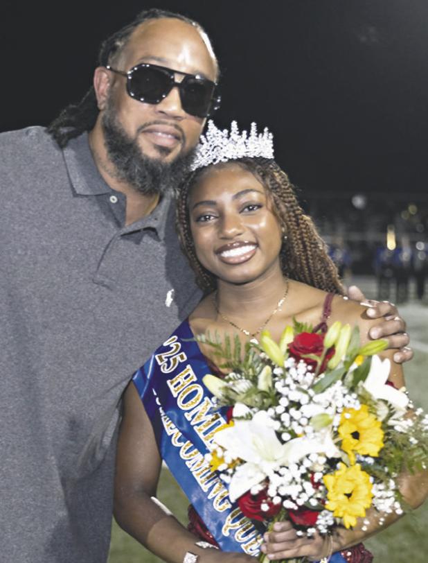 NEW QUEEN— Aaliyah Aspilaire was crowned homecoming queen at halftime at Friday night’s football game against Giddings by RHS Principal Wendy Mahan. Aspilaire was escorted by her father, Eric Mack.