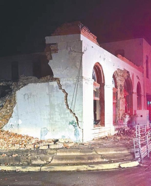 The front facade of the McVoy’s building was still standing after the roof collapsed early Sunday morning, but the Rockdale VFD determined it needed to come down over fears that it might fall onto Main Street.