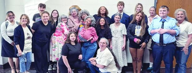 ONE ACT PLAY—Rockdale High School students participated in a UIL District 3A Area 19 One Act Play Contest last Wednesday at the Cameron ISD Performing Arts Center. Rockdale’s entry was “Any Body for Tea?” Kneeling on the floor in front are Addison Thomas and theater teacher Deana Caffey. Second row (L-R) assistant theater teacher Lisa Debault, Destinee Bluford, Illiana Roemelin, Neveah Switkowski, Madison Garcia, Carson Smith, Zabiah Green, Zachary Karl and RHS Principal Wendy Mahan. Back row (L-R) Mackenzi