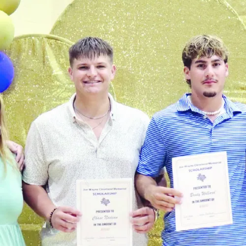 SCHOLARSHIPS— This year the Joe Wayne Cleveland Memorial Scholarships for $1,000 each went to Chase Nadeau and Brody Willard, shown here with Cleveland family members—(L-R) Kenny Cleveland, Shellea Griner, Sarah Cleveland and Nikki Kirk. See more photos from last Wednesday’s Rockdale High School award ceremony on page 6B.