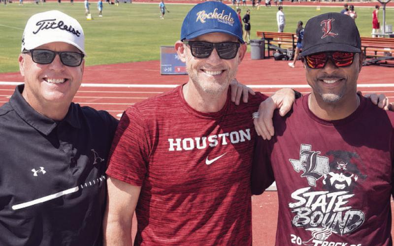 (L-R) Former Coach Jamie Boswell and former athletes Brooks Bassler and PJ Williams were in attendance at last week’s State Track Meet in Austin. Photo by Hunter Hamrick