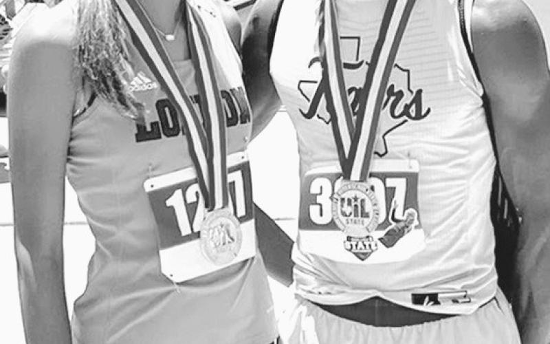 Photo by Hunter Hamrick (L-R) London High School freshman Alana Williams, daughter of Rockdale alum PJ Williams, and Rockdale High School senior De’Andre Stephens were both crowned state champs in the high jump last week in Austin.