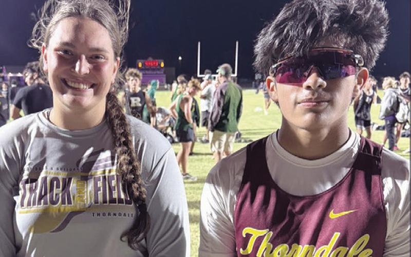 Two weeks ago at the Donald Beard Relays in Thorndale, Lady Dog Bethany Preusse (L) set a new school record in the shot put with a throw of 46’-1/2”. Last week at the Thrall Tiger Relays, Bulldog Jamie Llanas (R) set a new school record in the 1600M run with a time of 4:47.09. Thorndale ISD Athletics photo