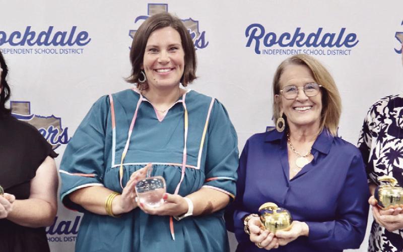 One teacher at each RISD campus was awarded a Teacher of the Year Golden Apple at the annual recognition banquet last Tuesday. Shown here are Taylor Grayson from Rockdale Intermediate School, Lauren Williams with Rockdale Elementary School, Lisa Debault from Rockdale High School and Lisa Laneer from Rockdale Junior High.