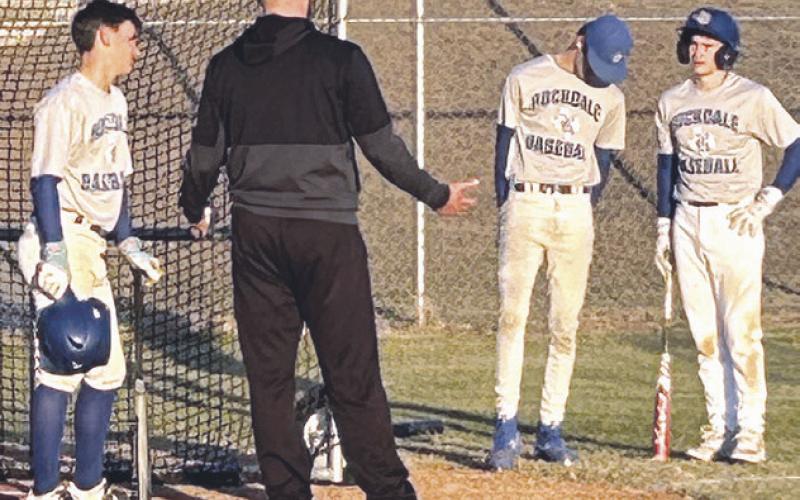 Rockdale Coach Pearce Loth gives words of wisdom to the Tiger baseball team. Reporter photo/Nathan Flores