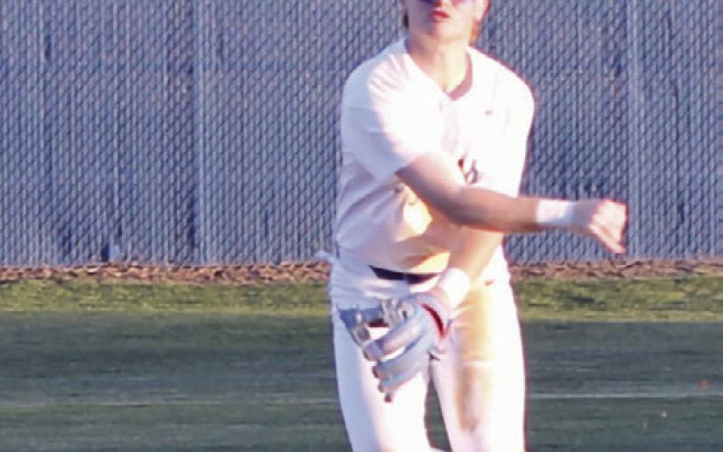 Reporter photos by Nathan Flores Rockdale’s Mason Willard (L) was on the bump for the Tigers on Tuesday and got his first win of the season. Greyson Williams (R) makes a play at shortstop in the win over the Gonzales Apaches during the Tigers first game of the season.