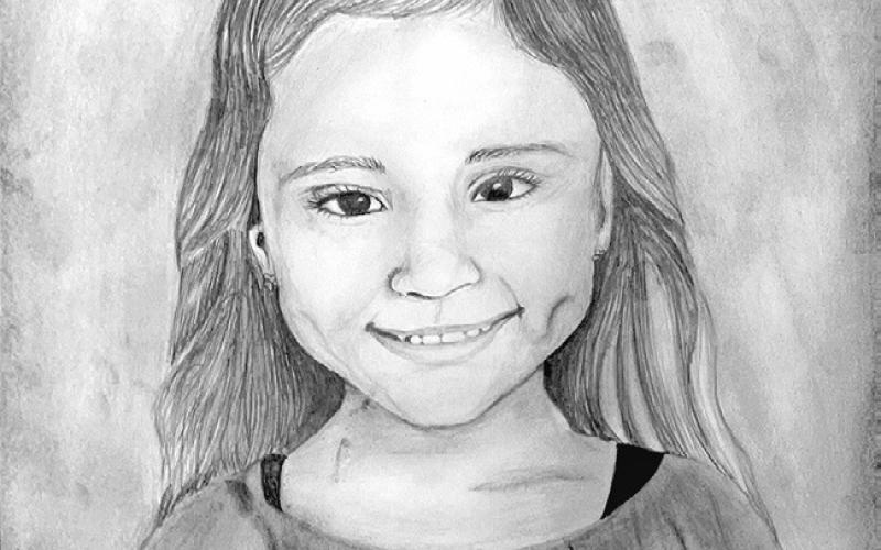 Self-portrait drawing by Jacie Hartley, an eighth-grader in Art II at Rockdale Junior High School.