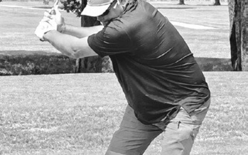 Rockdale Tiger Booster Club President tees off on hole 6 at the Rockdale Country Club during the annual booster club tournament. Reporter/Nathan Flores