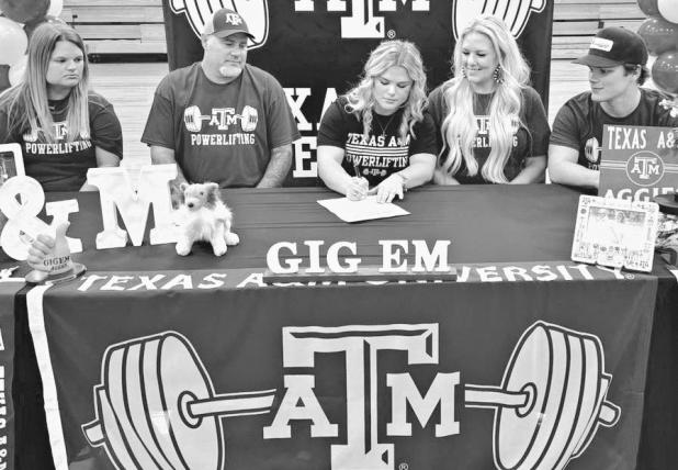 POWER SIGNING— Thorndale senior Jordyn Stutts signed with Texas A&amp;M University last week in Thorndale High School gym to continue her powerlifting career for the Aggies. Last month Stutts became a three-time state champion for the Lady Bulldogs, setting three state records in the process. Thorndale ISD Athletics photo
