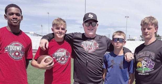 Milam County athletes attending this week’s Todd Dodge Football Camp in the DFW Metroplex are (L-R) Canaan Miles, Carson Thurman, with Coach Dodge, Carter Thurman, Shiner Thurman. Photo by Andrew Thurman