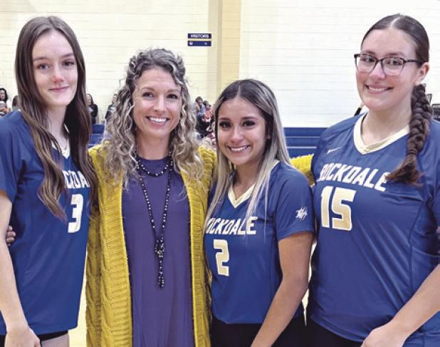 Before Tuesday night’s matches, Rockdale recognized Lady Tigers seniors Hally Simonton (3), Mariana Vargas (2) and Jayla Gonzales (15), shown here with Coach Holly Muniz. Photo submitted by Holly Muniz