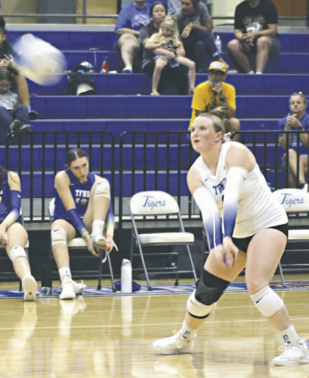 Rockdale Lady Tiger Alli Lay returns a serve on Tuesday at Tiger Gym. Reporter/Nathan Flores