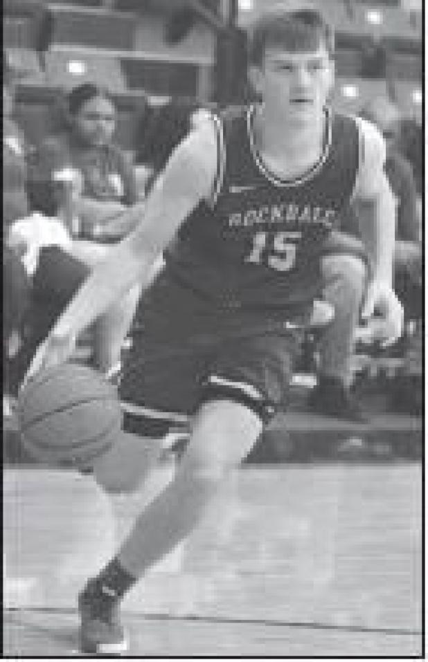 Reporter/Wynton Thomason Ross Loth dribbles down court earlier this season.