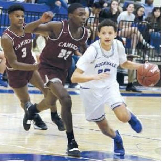 Magnificent seven fall to Yoe 