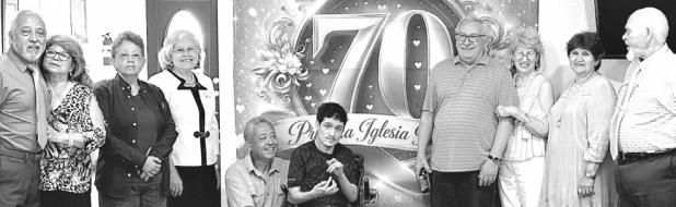 ANNIVERSARY— Primera Iglesia Bautista at 665 North Main Street held its 70th anniversary celebration recently. Shown here (l-R) are Mario and Marilu Gonzalez, Olga Gonzalez, Maria Luisa Sandaña, Carlos and Carlitos Gonzalez, Ricardo and Edy Jerrera, Manuela Avila and Pastor Luis Valdivia.