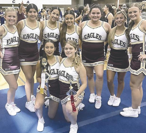 Milano varsity cheerleaders receive hardware at camp