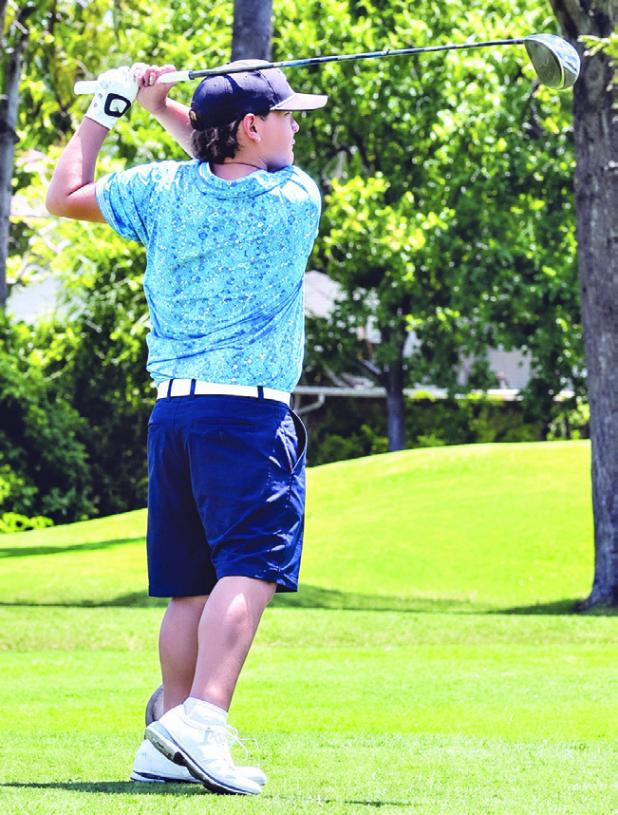Karter Puckett takes a swing during the STPGA Junior Golf Championship held in The Woodlands last week. Photo by Sonora Puckett