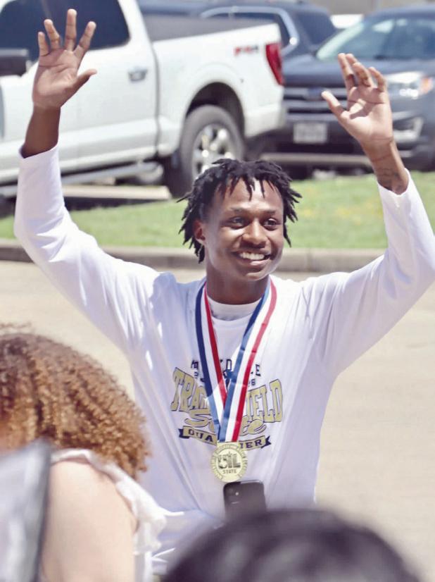 Tiger senior De’Andre Stephens is welcomed home after being crowned state champ in the high jump. Rockdale Tigers Athletics photo
