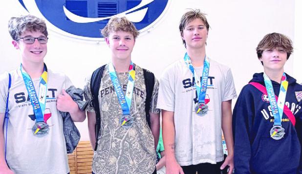 Relay team 13-14 boys (L-R) Andy Wyatt, Garrison Ulrich, Stratton Masek and Harlo Mankin. Photo by Julie Masek