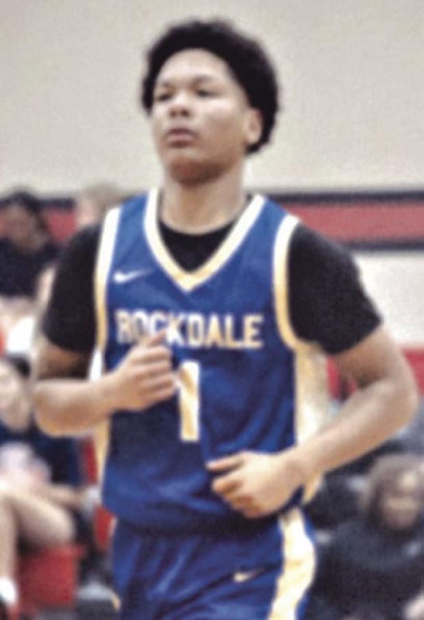 Rockdale Tiger Jeremiah Watts (1) heads down court during the Hays Tournament in Buda last week. Watts helped contribute to the Tiger offense. Rockdale Tigers Athletics photo