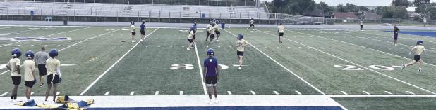 Tigers begin two-a-days with 65 reporting