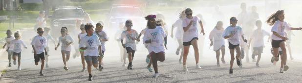 Local youth run wild on Global Running Day