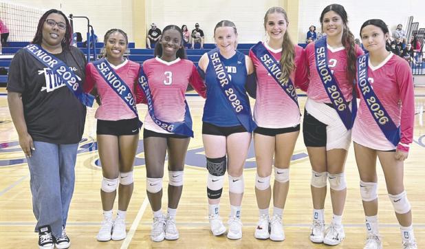 Senior Night 2025 ended for the Rockdale Lady Tigers with a three-game win against the Rogers Lady Eagles to keep their playoff hopes alive. Lady Tiger seniors being honored Friday night were (L-R) Jerneé Mitchell (manager), Aaliyah Aspilaire, Trinity Hurd, Alli Lay, Grace Patton, Parker White and Hannah Mckie. Rockdale Tigers Athletics photo