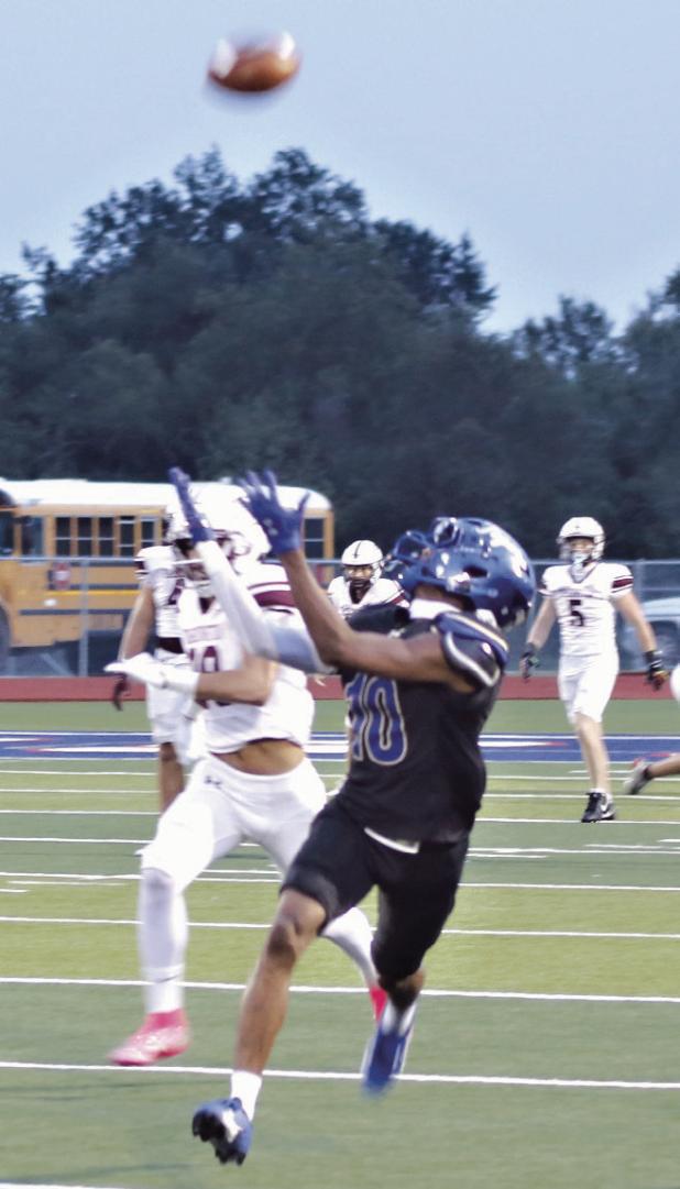 At right, Rockdale Tiger senior wide receiver De’Andre Stephens was named Offensive Player of the Year for District 11-3A. He shares the honor with senior Academy running back Brian Grissom and senior Franklin quarterback Walker Anderson. Below, Tiger All-District defenders were senior safety De’Andre Stephens (10), senior linebacker Brody Willard (6) and senior linebacker Wilmer Sorto (0). Reporter photos by Nathan Flores