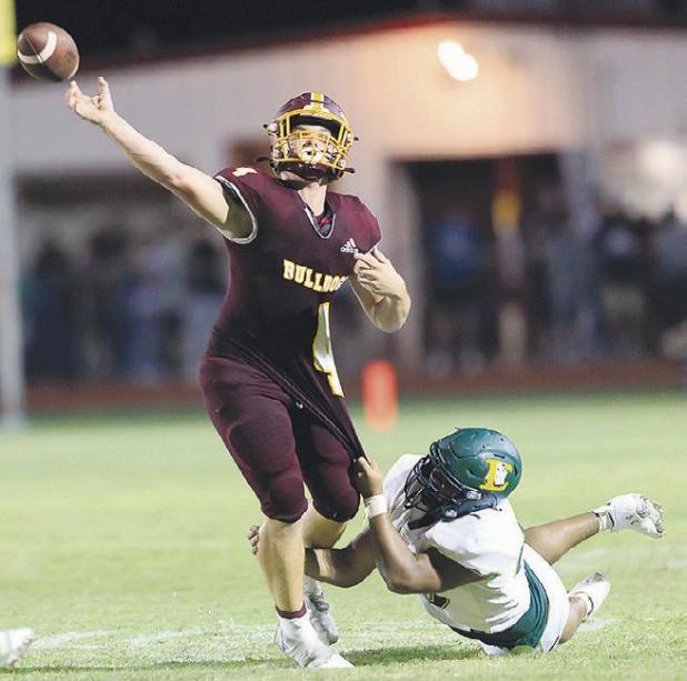 Dawgs attack Lions in overtime, 35-33
