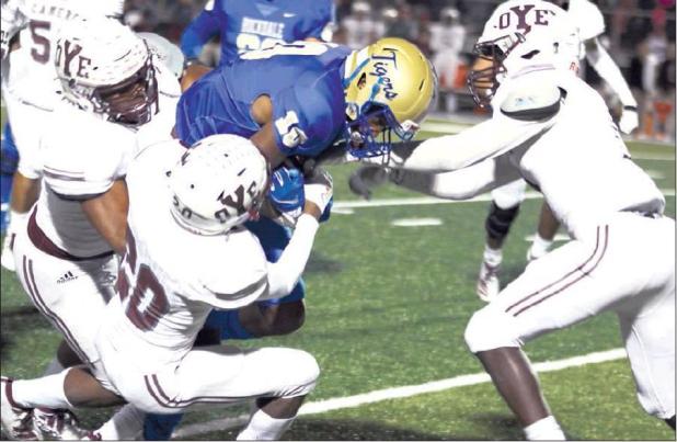 Yoemen defense keeps Bell in Cameron, 31-3