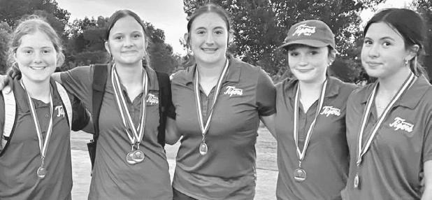 SECOND —The Rockdale Junior High girls team secured a second place finish in the Cameron Middle School Golf Tournament last week. Pictured are (L-R) Sydney Hall, Kelbi Stanislaw, Kathryn San Miguel, Taylor Carpenter and Chanley Garza. As a team, they scored 273 with Stanislaw placing second individually with an impressive 61. The boys team also put in a valiant effort throughout the tournament. Rockdale Tigers Athletics photo