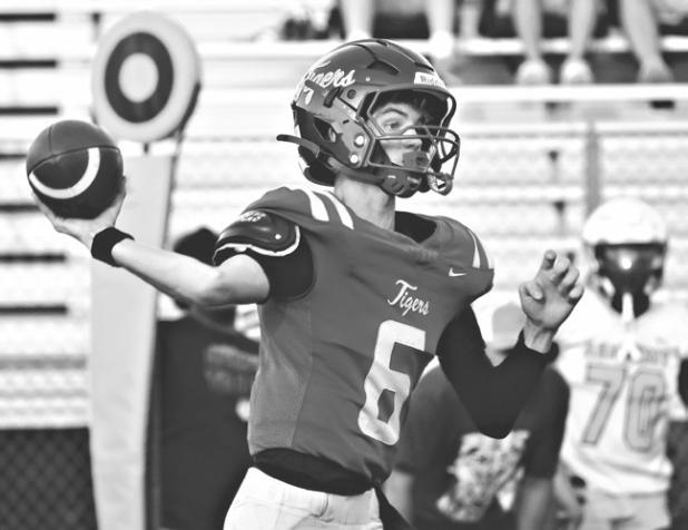 Quarterback Hayze Hamrick threw a touchdown pass in the win over Academy to keep the JV Tigers undefeated. Photo by Ashley Zenner Willard