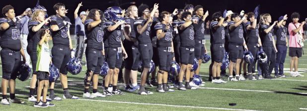Reporter/Nathan Flores Tiger players join in on the final post-game playing of the Rockdale alma mater for the 2025 season. For the Tiger seniors, it was their last time doing the alma mater as their high school careers came to an end. The Tigers finished 1-4 in district, failing to make the playoffs.