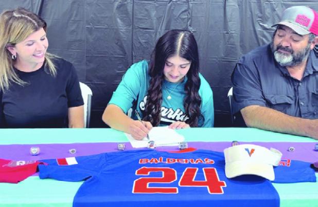COMMITTED— Milano High School senior Marissa Balderas (center) recently signed to continue her softball career at Southeast Arkansas College, as her mother and father, Shanna and J.R. Balderas, look on. Submitted photo
